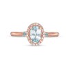 Thumbnail Image 4 of Cherished Promise Collection™ Blue Topaz and 1/20 CT. T.W. Diamond Oval Frame Promise Ring in 10K Rose Gold