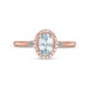 Thumbnail Image 3 of Cherished Promise Collection™ Blue Topaz and 1/20 CT. T.W. Diamond Oval Frame Promise Ring in 10K Rose Gold