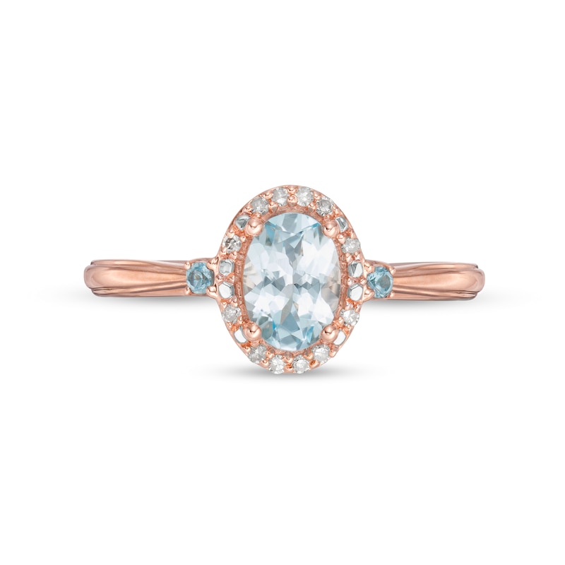 Main Image 4 of Cherished Promise Collection™ Blue Topaz and 1/20 CT. T.W. Diamond Oval Frame Promise Ring in 10K Rose Gold