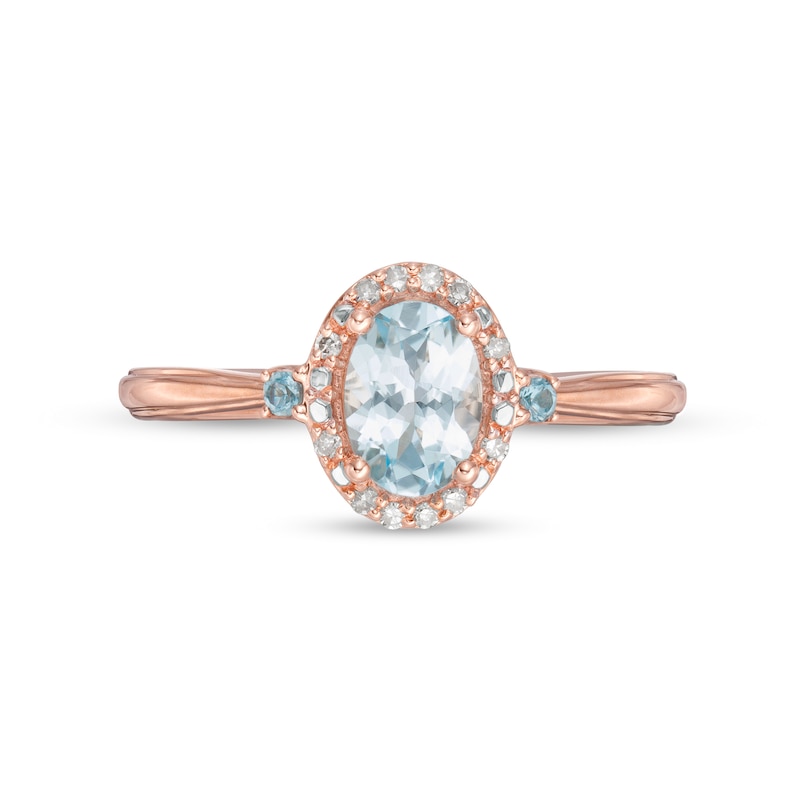 Cherished Promise Collection™ Blue Topaz and 1/20 CT. T.W. Diamond Oval Frame Promise Ring in 10K Rose Gold