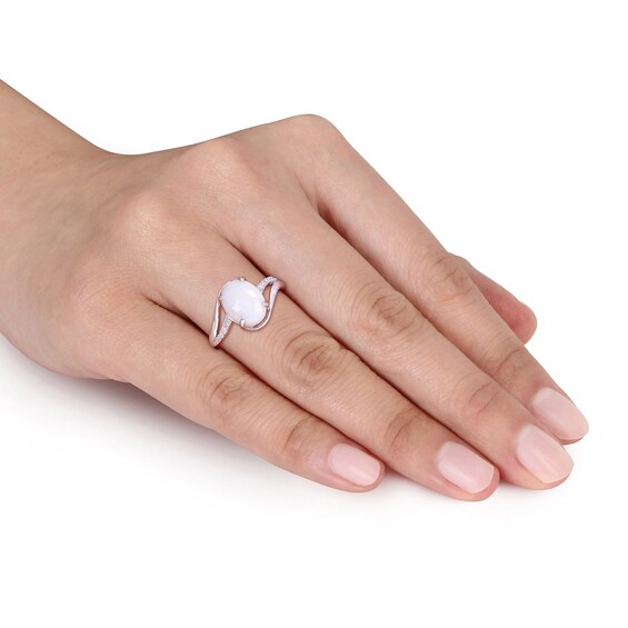 Oval Opal and 1/15 CT. T.w. Diamond Bypass Split Shank Ring in Sterling Silver