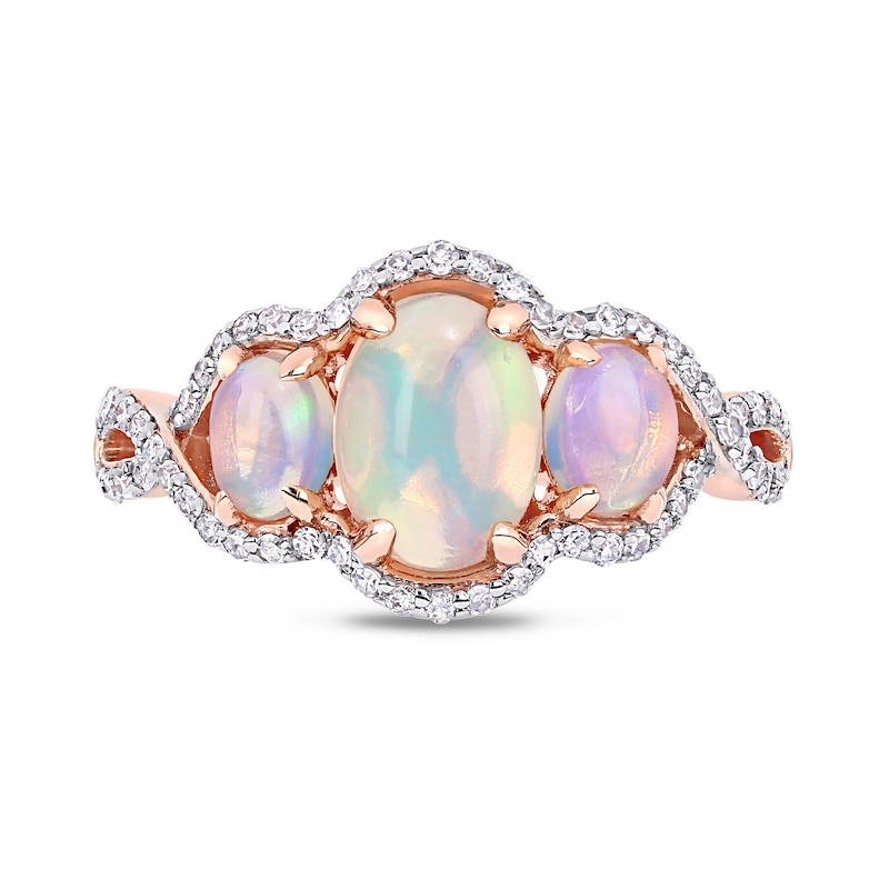 Oval Cabochon Opal and 1/3 CT. T.W. Diamond Frame Three Stone Twist Shank Ring in 10K Rose Gold