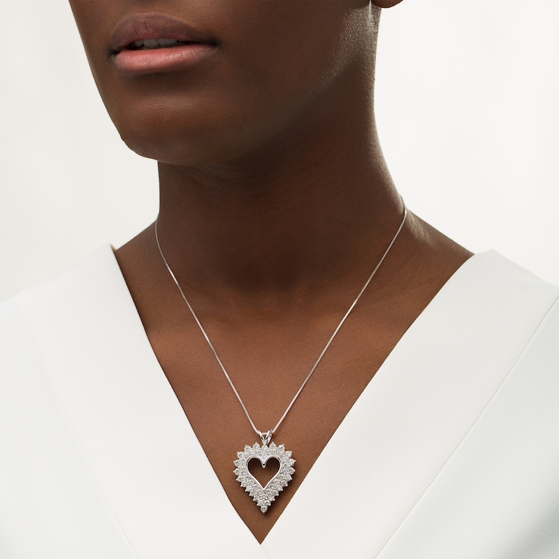 Main Image 2 of 4 CT. T.W. Diamond Sunburst Frame Heart Pendant in Sterling Silver