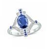 Thumbnail Image 0 of Oval Lab-Created Blue Sapphire and 1/15 CT. T.W. Diamond Art Deco Evil Eye Ring in Sterling Silver