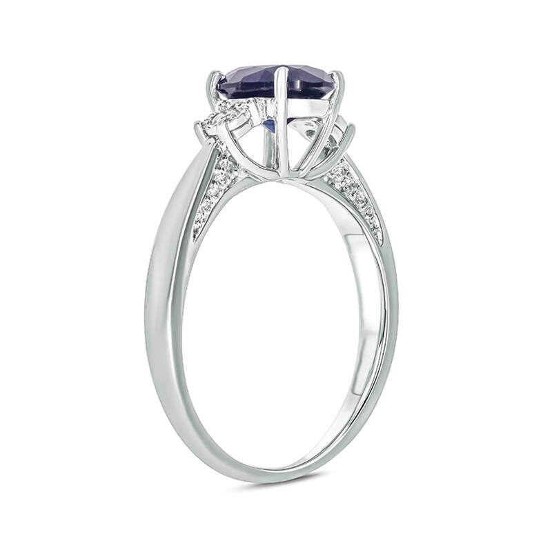 Oval Lab-Created Blue and White Sapphire with 1/15 CT. T.W. Diamond Three Stone Ring in Sterling Silver