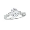 Thumbnail Image 1 of Oval Lab-Created White Sapphire and 1/15 CT. T.W. Diamond Three Stone Ring in Sterling Silver