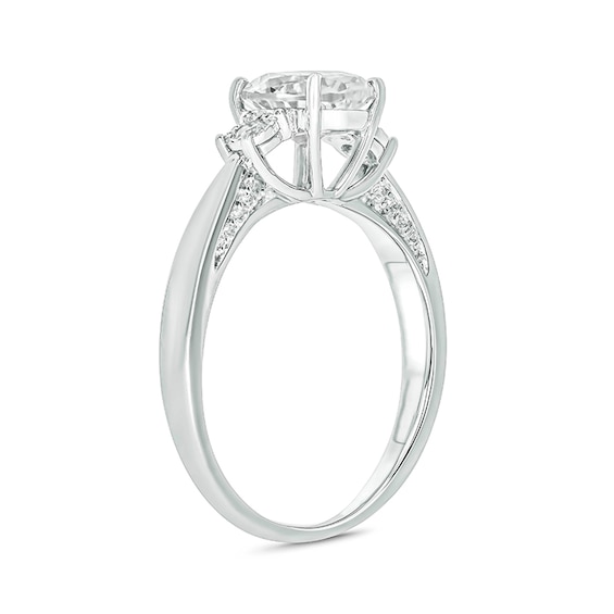 Oval Lab-Created White Sapphire and 1/15 CT. T.w. Diamond Three Stone Ring in Sterling Silver