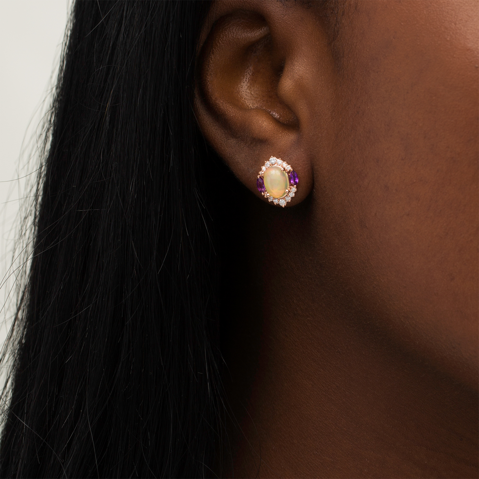 Main Image 2 of Captivating Color Oval Opal, Amethyst and 1/4 CT. T.W. Diamond Border Three Stone Stud Earrings in 14K Rose Gold