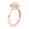 Oval Opal and 1/10 CT. T.W. Diamond Bead Frame Sunburst Ring in 10K Rose Gold
