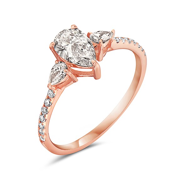 1-1/3 CT. T.w. Pear-Shaped Diamond Three Stone Engagement Ring in 14K Rose Gold