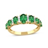 Thumbnail Image 0 of Oval Emerald and 1/6 CT. T.W. Diamond Graduated Seven Stone Alternating Trios Ring in 10K Gold