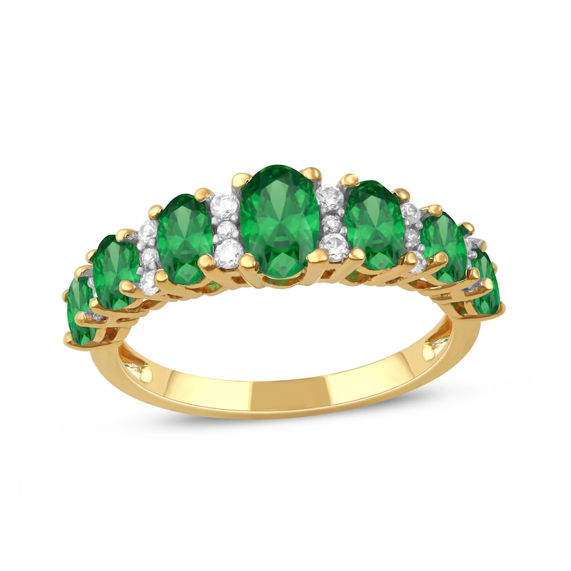 Oval Emerald and 1/6 CT. T.W. Diamond Graduated Seven Stone Alternating Trios Ring in 10K Gold