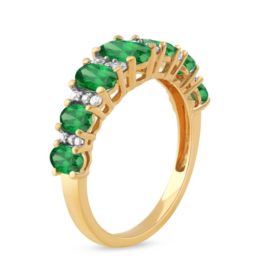 Oval Emerald and 1/8 CT. T.w. Diamond Graduated Seven Stone Alternating Trios Ring in 10K Gold