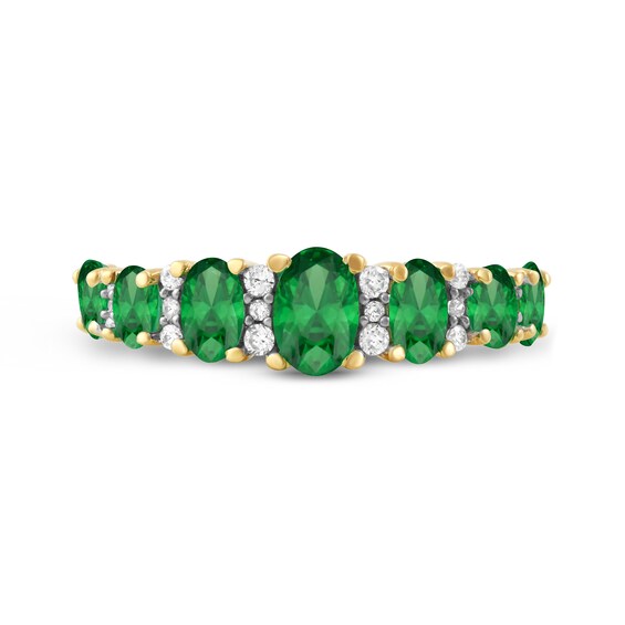 Oval Emerald and 1/8 CT. T.w. Diamond Graduated Seven Stone Alternating Trios Ring in 10K Gold