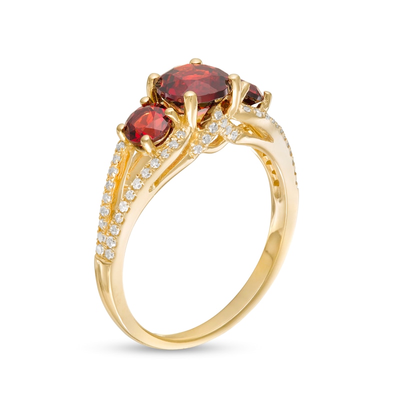 Main Image 3 of 6.0mm Garnet and 1/5 CT. T.W. Diamond Three Stone Split Shank Ring in 10K Gold