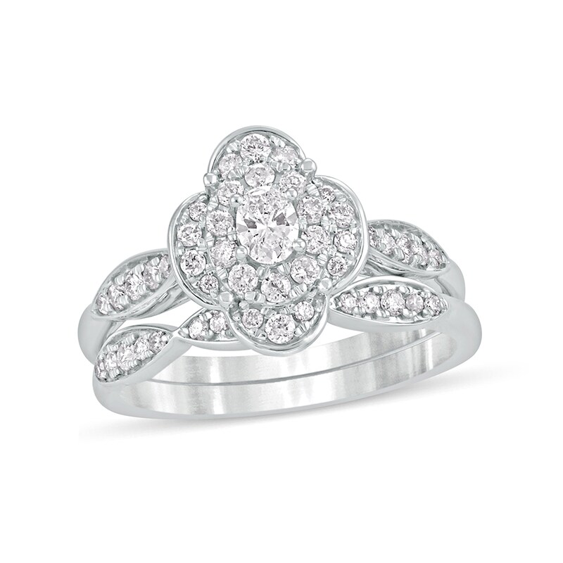 5/8 CT. T.W. Oval Diamond Quatrefoil Frame Art Deco Bridal Set in 10K White Gold