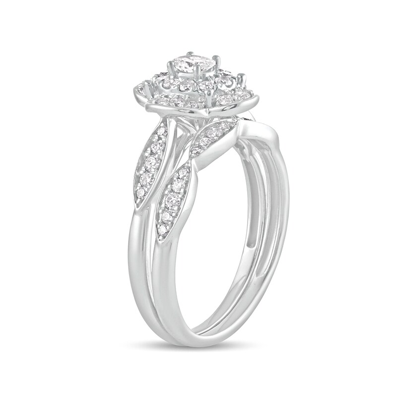 5/8 CT. T.W. Oval Diamond Quatrefoil Frame Art Deco Bridal Set in 10K White Gold