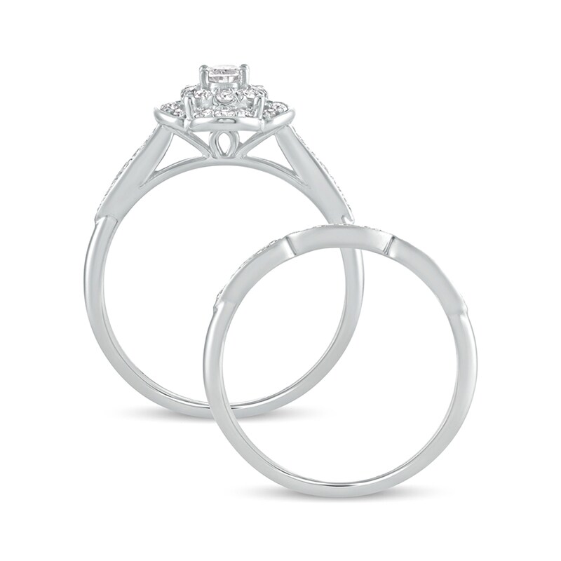 5/8 CT. T.W. Oval Diamond Quatrefoil Frame Art Deco Bridal Set in 10K White Gold