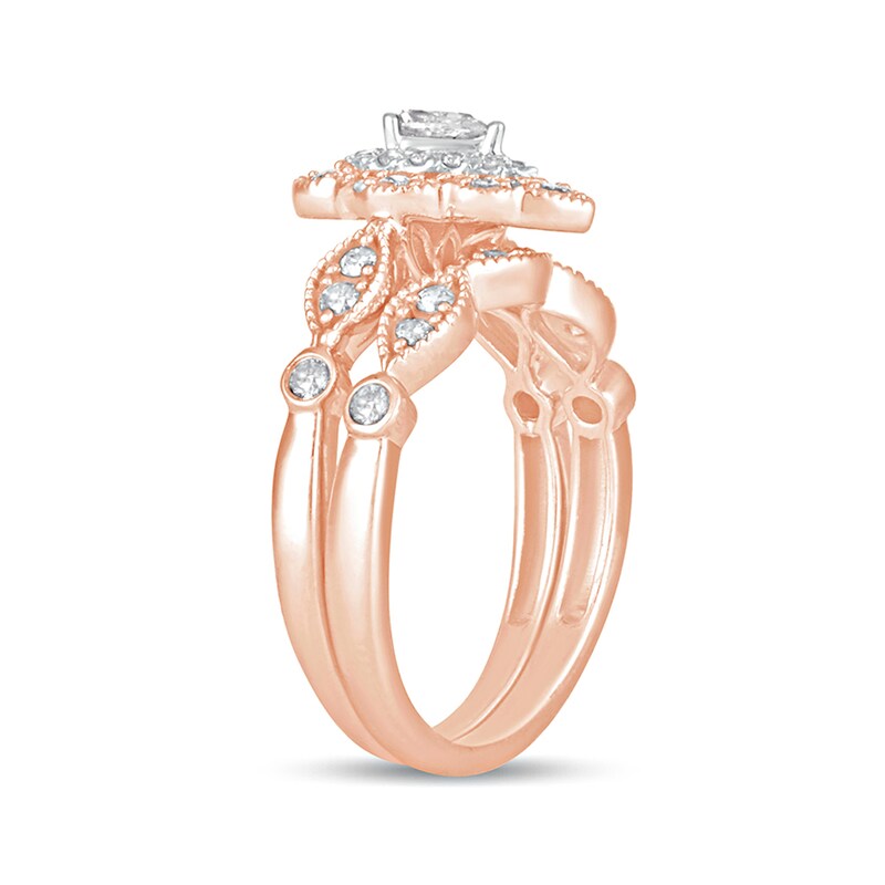 5/8 CT. T.W. Pear-Shaped Diamond Double Petal Frame Vintage-Style Bridal Set in 10K Rose Gold