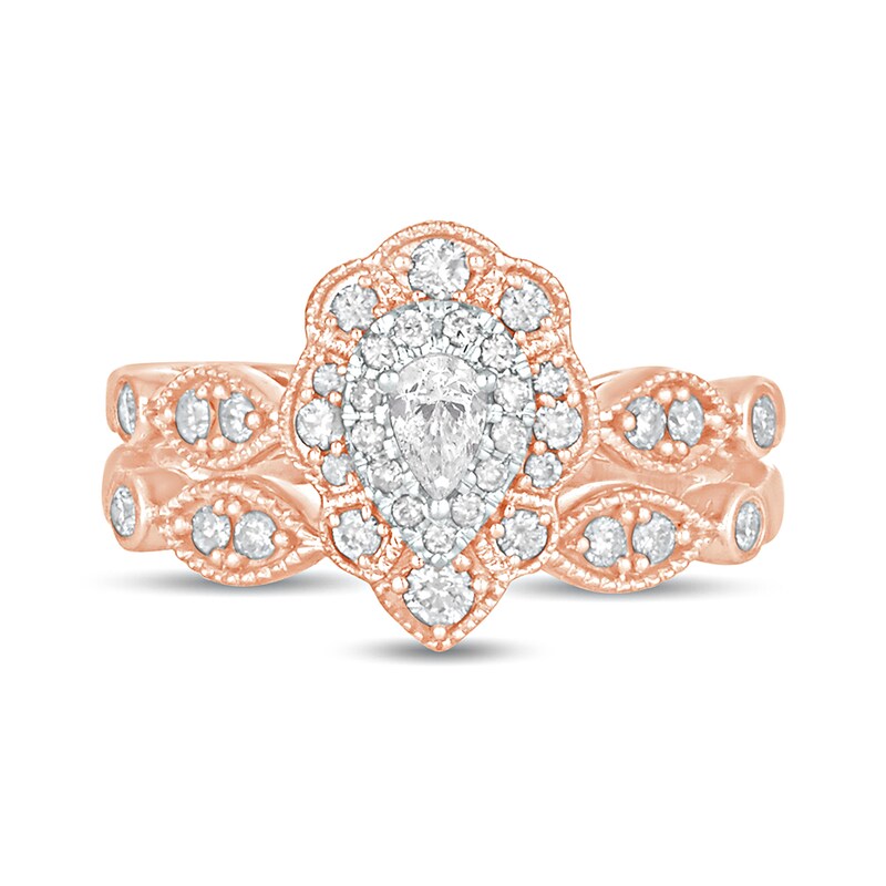 5/8 CT. T.W. Pear-Shaped Diamond Double Petal Frame Vintage-Style Bridal Set in 10K Rose Gold