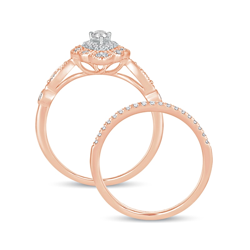 5/8 CT. T.W. Pear-Shaped Diamond Double Petal Frame Vintage-Style Bridal Set in 10K Rose Gold