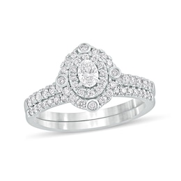 5/8 CT. T.W. Oval Diamond Double Frame Bridal Set in 10K White Gold