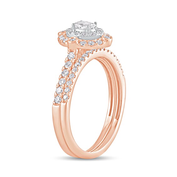 5/8 CT. T.w. Oval Diamond Double Frame Bridal Set in 10K Rose Gold