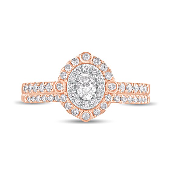 5/8 CT. T.w. Oval Diamond Double Frame Bridal Set in 10K Rose Gold