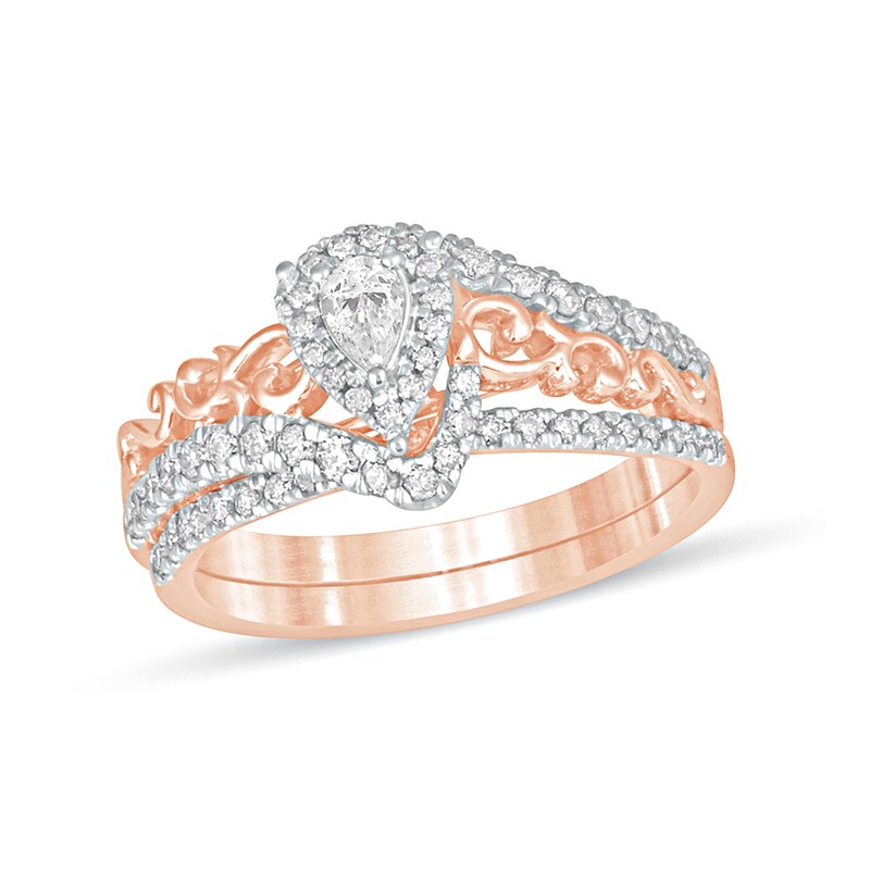 5/8 CT. T.W. Pear-Shaped Diamond Double Frame Filigree Bypass Bridal Set in 10K Rose Gold