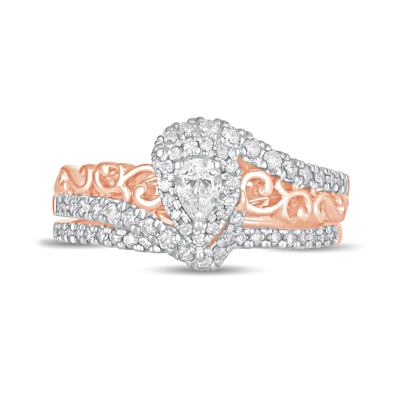 5/8 CT. T.W. Pear-Shaped Diamond Double Frame Filigree Bypass Bridal Set in 10K Rose Gold