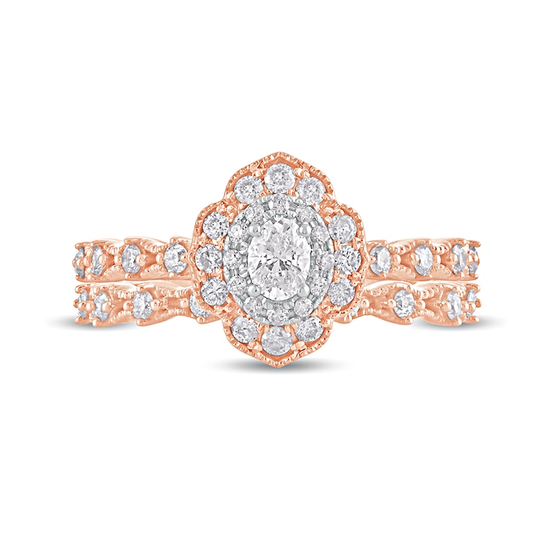 5/8 CT. T.W. Oval Diamond Frame Vintage-Style Bridal Set in 10K Rose Gold