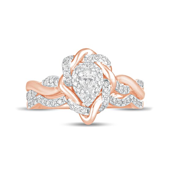 5/8 CT. T.w. Pear-Shaped Diamond Frame Twist Shank Bridal Set in 10K Rose Gold