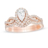 Thumbnail Image 1 of 1 CT. T.W. Pear-Shaped Diamond Frame Twist Split Shank Bridal Set in 14K Rose Gold