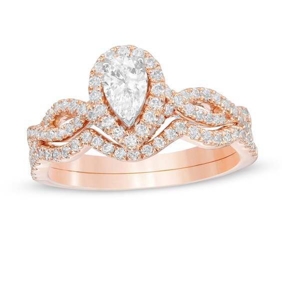 1 CT. T.w. Pear-Shaped Diamond Frame Twist Split Shank Bridal Set in 14K Rose Gold