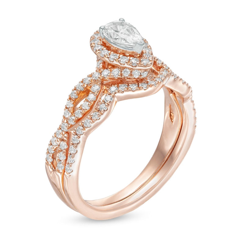 Main Image 3 of 1 CT. T.W. Pear-Shaped Diamond Frame Twist Split Shank Bridal Set in 14K Rose Gold