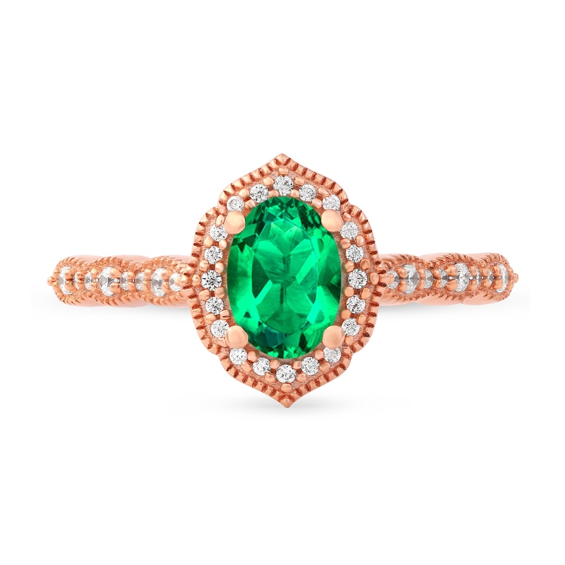 Oval Emerald and 1/6 CT. T.W. Diamond Quatrefoil Frame Vintage-Style Ring in 10K Rose Gold