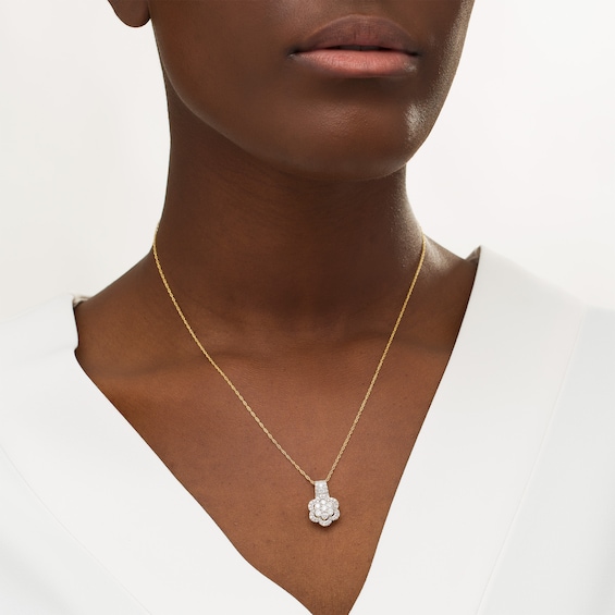 1 CT. T.W. Composite Diamond Flower Frame Drop Pendant in 10K Gold 1 CT. T.W. Composite Diamond Flower Frame Drop Pendant in 10K Gold