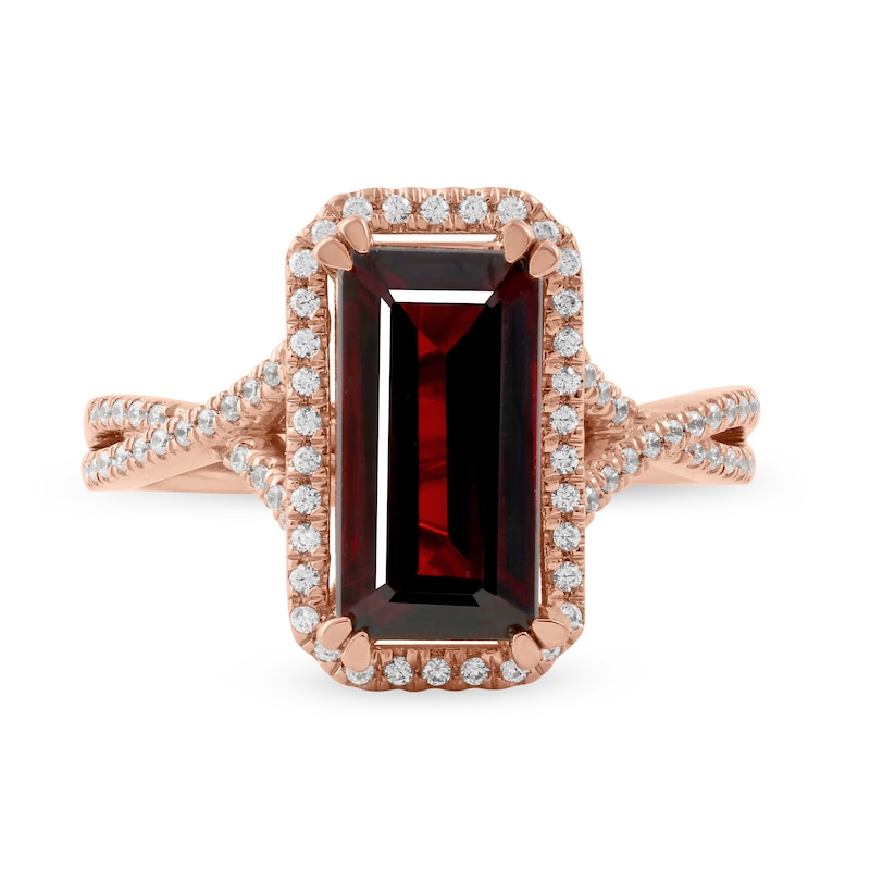 Emerald-Cut Garnet and 1/4 CT. T.W. Diamond Octagonal Frame Crossover Shank Ring in 10K Rose Gold