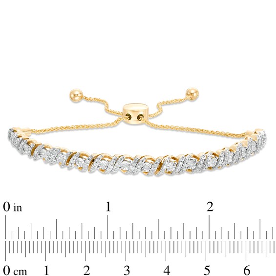 1/ CT. T.w. Diamond Cascading Bolo Bracelet in 10K Gold
