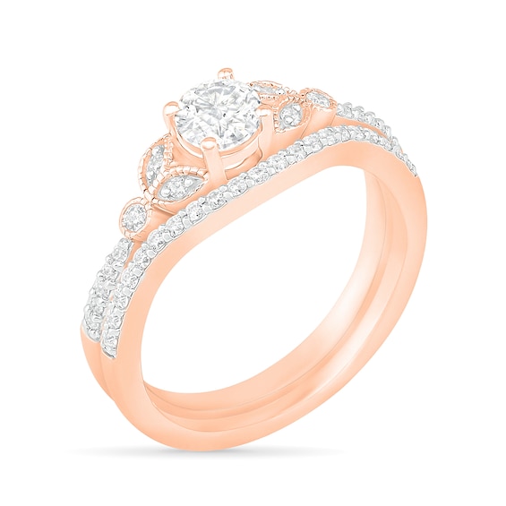 4.5mm Lab-Created White Sapphire and 1/5 CT. T.w. Diamond Bridal Set in Sterling Silver with 14K Rose Gold Plate