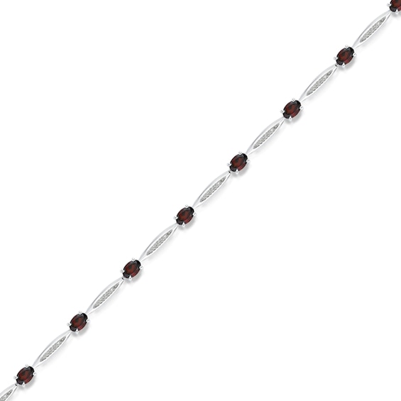 Oval Garnet and 1/6 CT. T.w. Diamond Link Bracelet in Sterling Silver - 7.25"