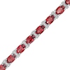 Thumbnail Image 1 of Oval Garnet and Diamond Accent Beaded Alternating Line Bracelet in Sterling Silver - 7.25"