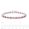 Thumbnail Image 4 of Oval Garnet and Diamond Accent Beaded Alternating Line Bracelet in Sterling Silver - 7.25"
