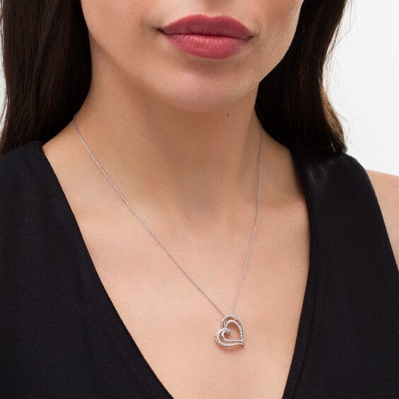 1/20 CT. T.W. Diamond Tilted Double Heart Pendant in Sterling Silver 1/20 CT. T.W. Diamond Tilted Double Heart Pendant in Sterling Silver