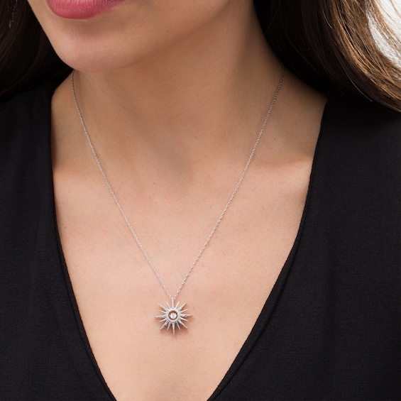 0.09 CT. T.w. Diamond Sunburst Pendant in Sterling Silver