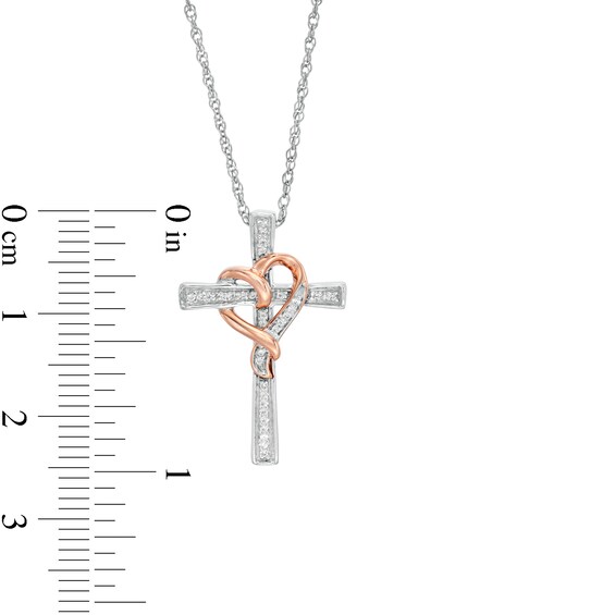 1/15 CT. T.w. Diamond Cross with Ribbon Heart Overlay Pendant in Sterling Silver and 10K Rose Gold