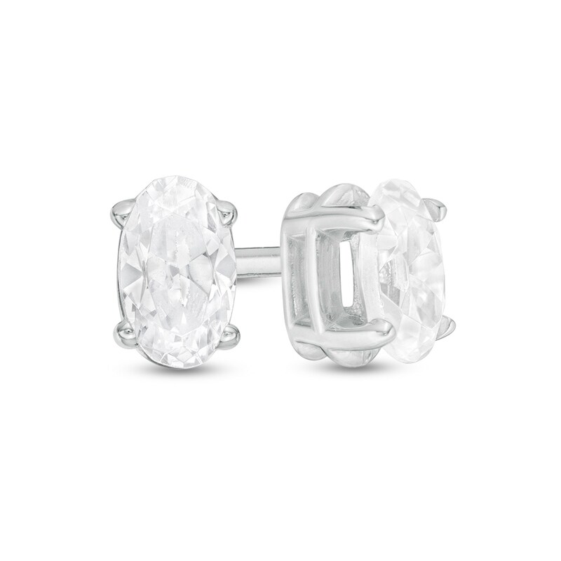 Main Image 1 of 1/2 CT. T.W. Certified Oval Diamond Solitaire Stud Earrings in 14K White Gold (I/I2)