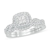 Thumbnail Image 1 of 1/2 CT. T.W. Quad Princess-Cut Diamond Cushion Frame Twist Shank Bridal Set in 10K White Gold