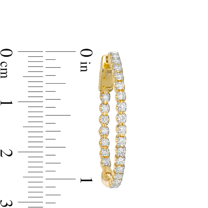 Main Image 2 of Marilyn Monroe™ Collection 1 CT. T.W. Journey Diamond Inside-Out Hoop Earrings in 10K Gold