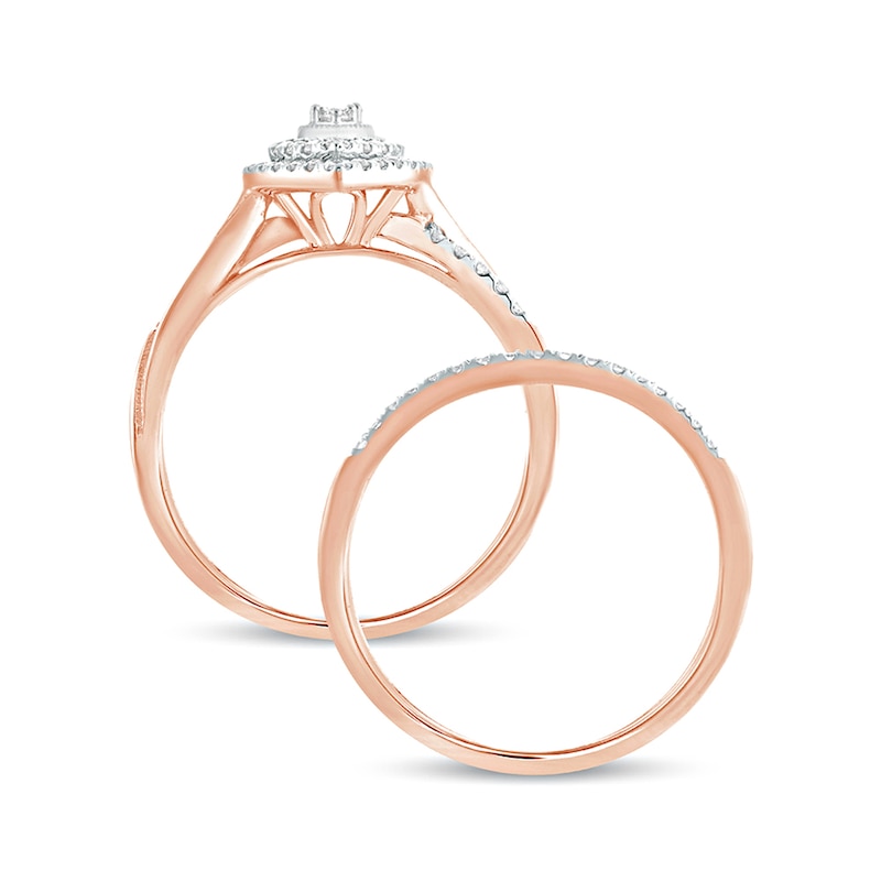 3/8 CT. T.W. Composite Diamond Pear-Shaped Double Frame Twist Shank Bridal Set in 10K Rose Gold